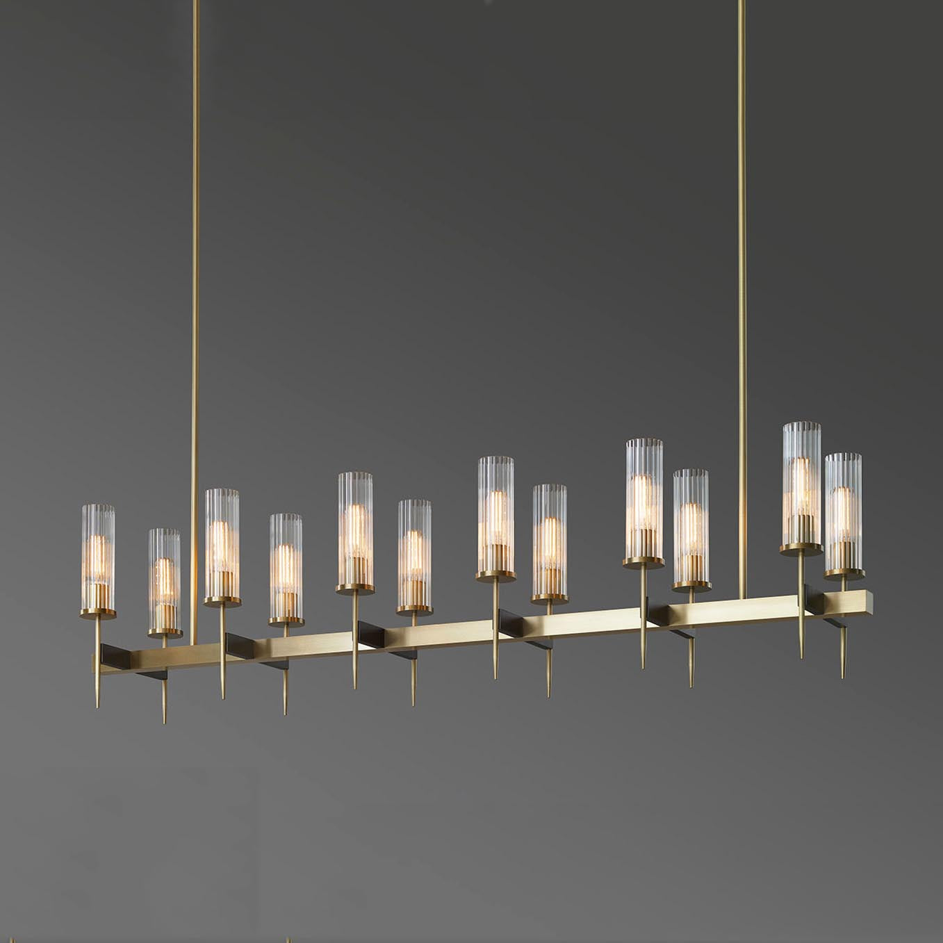 Ayn Modern Cylinder Modernist Brass Linear Chandelier chandelier Kevin Studio Inc